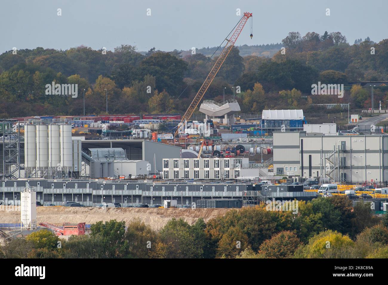 West Hyde, UK. 22nd October, 2022. The HS2 South Portal Compound where the 10 mile Chiltern Tunnel is being bored underneath the Chilterns by two tunnel boring machines called Florence and Cecilia. Concrete for building the railway viaducts is manufactured at the site as are the concrete wall tunnel segments. Phase 1 of the HS2 project is reported to be vastly over budget and the Treasury  have asked for a financial review to take place. Environmentalists are continuing their fight to get HS2 to be cancelled. Credit: Maureen McLean/Alamy Live News Stock Photo