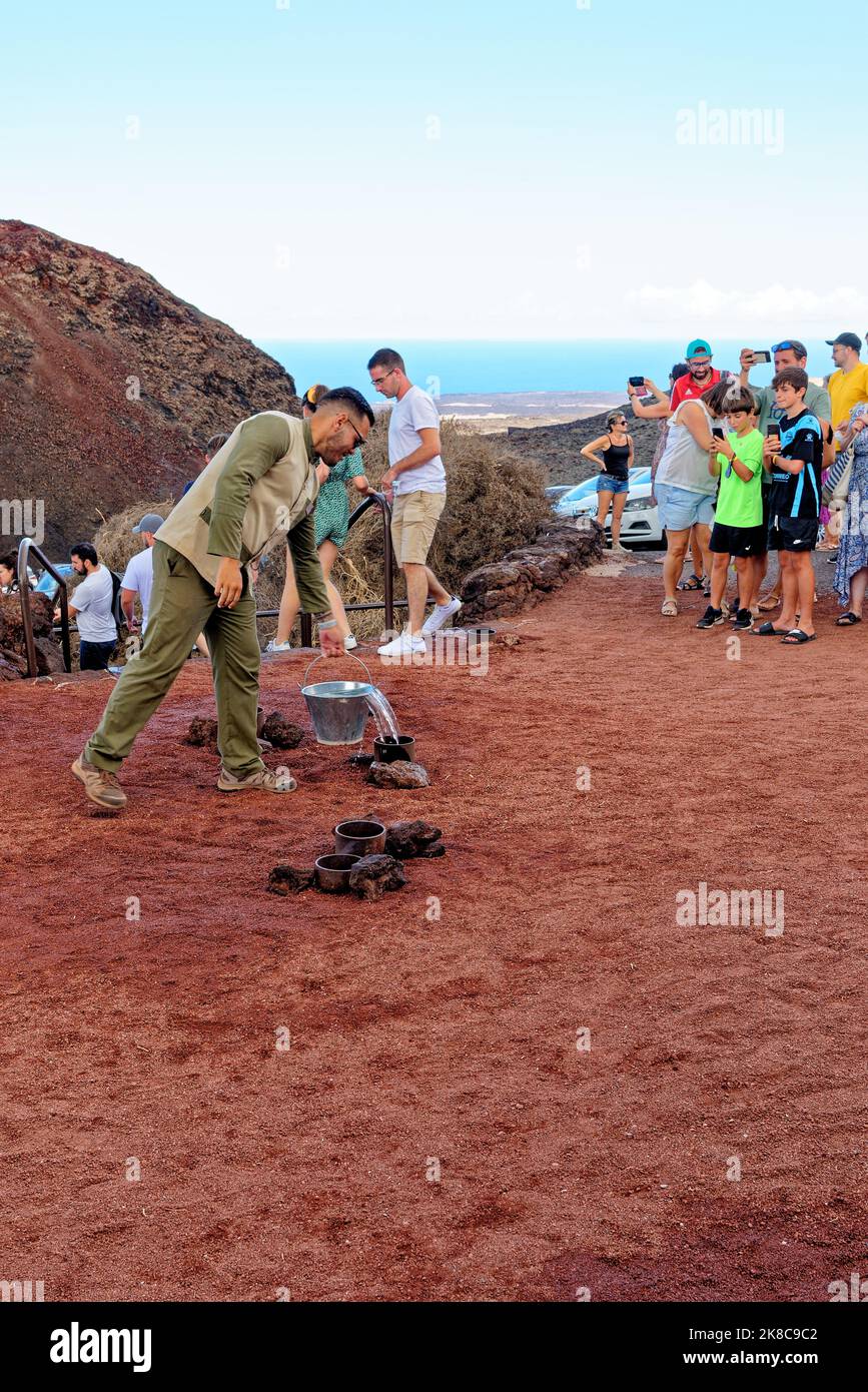Steam vent or geyser on Montanas del Fuego. Demonstration of artificial