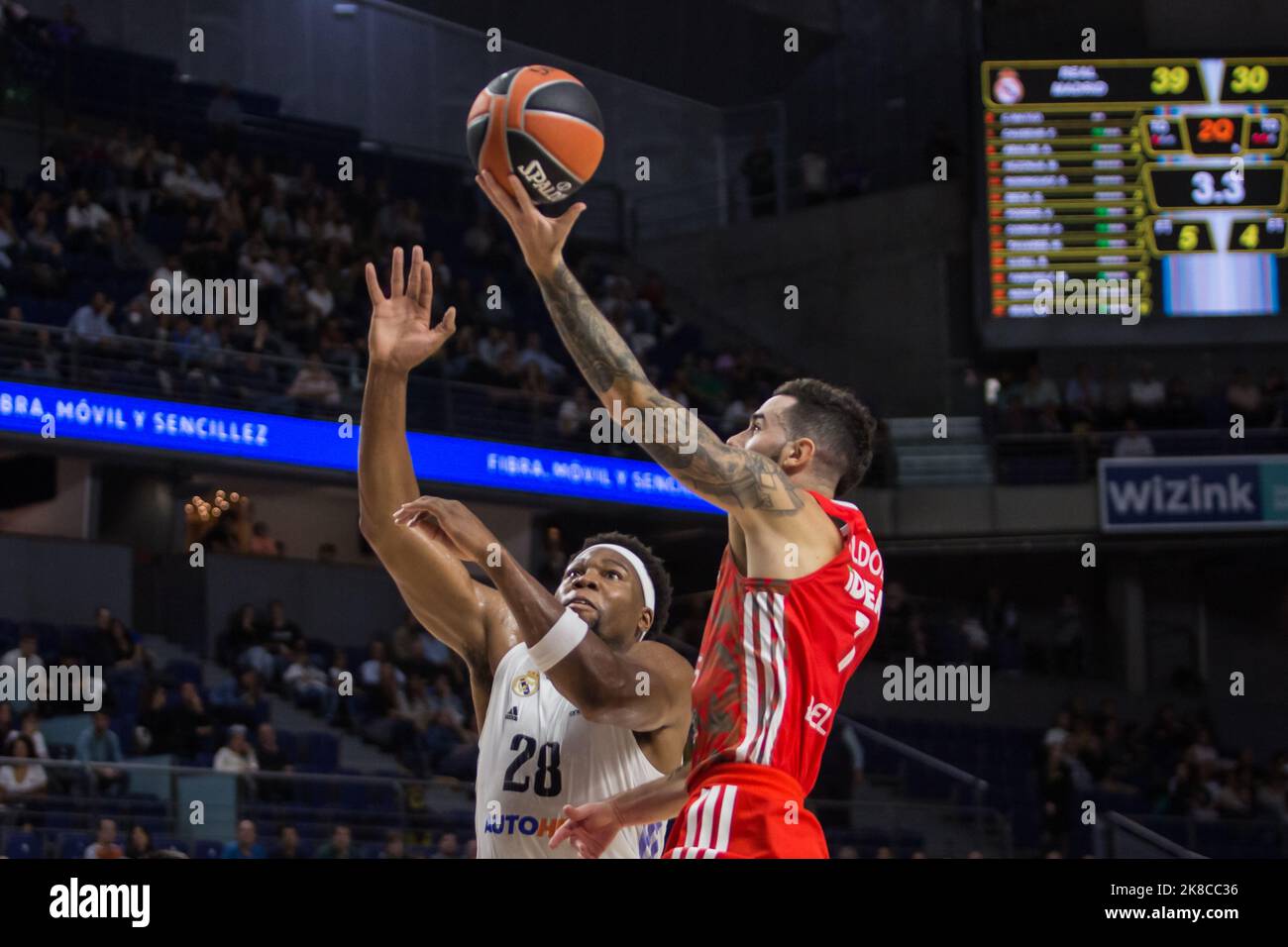 Madrid, Madrid, Spain. 21st Oct, 2022. Guerschon Yabusele (L) and Luca Vildoza (R).during Real Madrid victory over Crvena Zvezda mts Belgrade 72 - 56 in Turkish Airlines Euroleague regular season game (round 4) celebrated at WiZink Center in Madrid (Spain). October 21st 2022. (Credit Image: © Juan Carlos GarcÃ-A Mate/Pacific Press via ZUMA Press Wire) Stock Photo