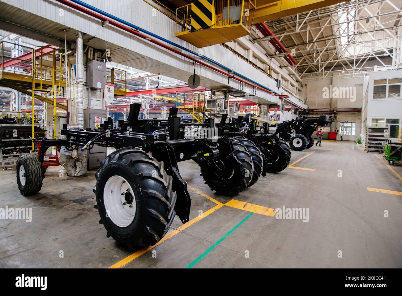 The process of assembling agricultural tractors and harvesters Stock Photo