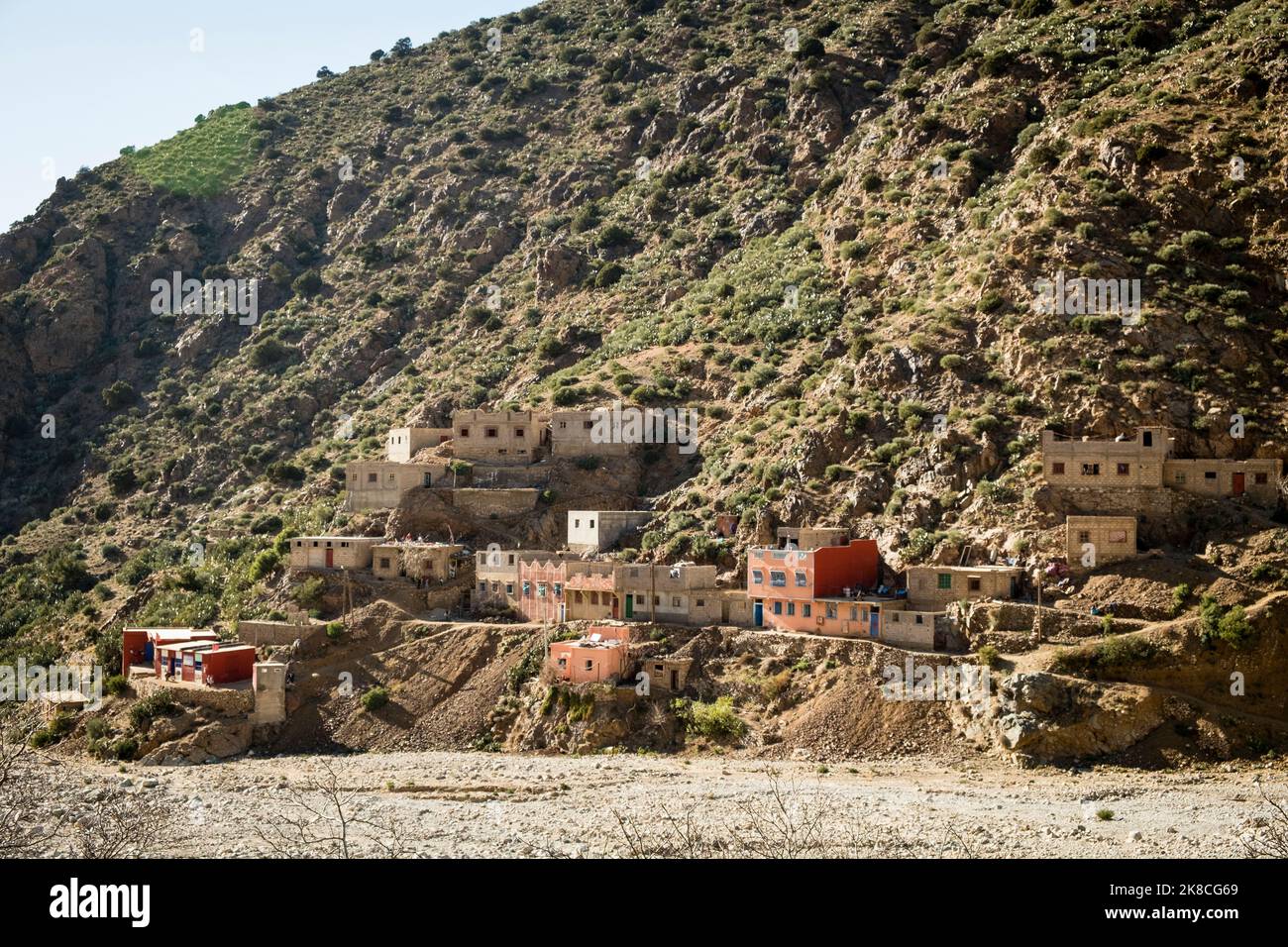 Berber village with homes nestled into the hillside, High Atlas Mountains, Ourika Valley, Morocco, North Africa Stock Photo