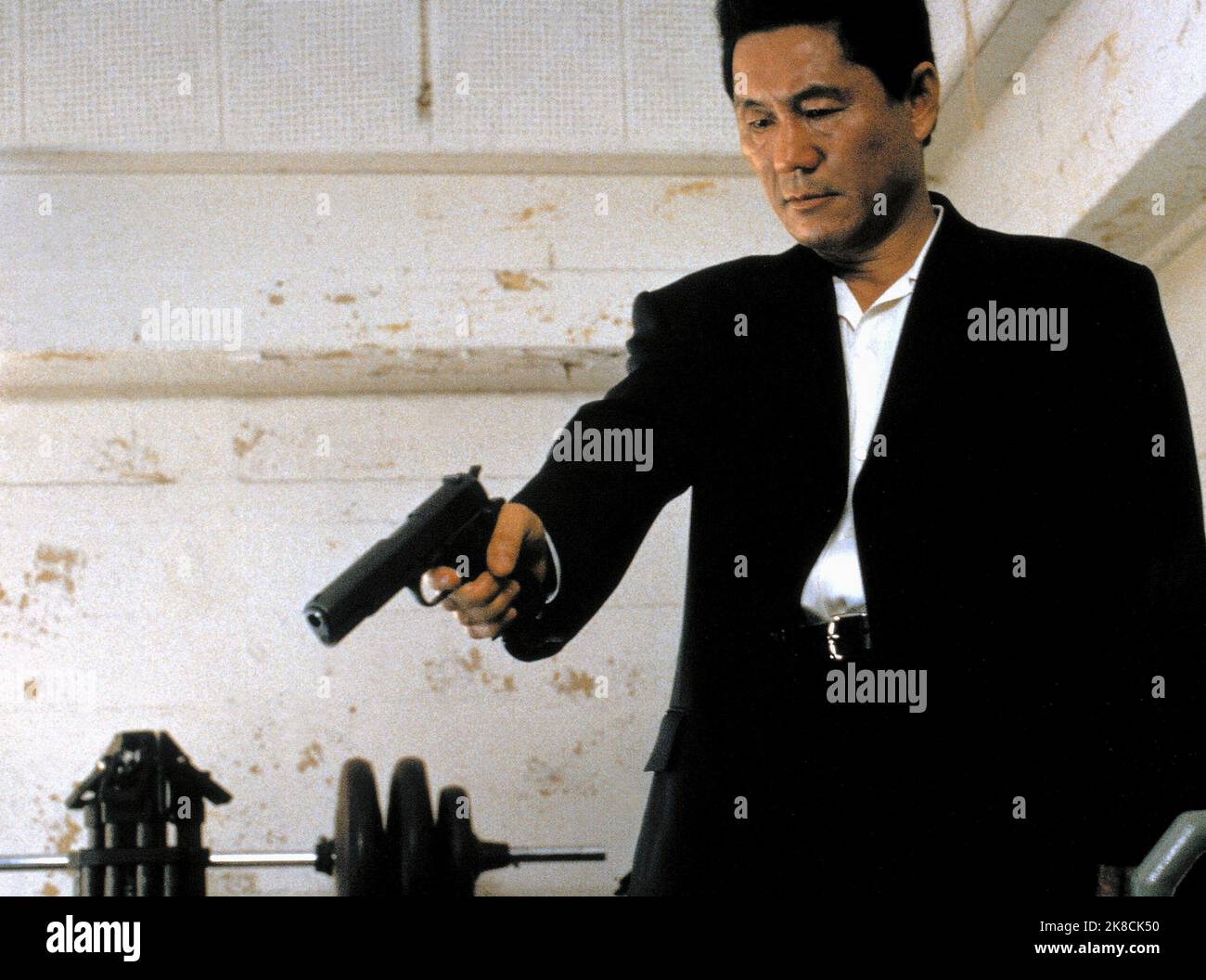 Takeshi Kitano Film: Brother (2000) Characters: Aniki Yamamoto  Director: Takeshi Kitano 09 September 2000   **WARNING** This Photograph is for editorial use only and is the copyright of CHANNEL 4 and/or the Photographer assigned by the Film or Production Company and can only be reproduced by publications in conjunction with the promotion of the above Film. A Mandatory Credit To CHANNEL 4 is required. The Photographer should also be credited when known. No commercial use can be granted without written authority from the Film Company. Stock Photo