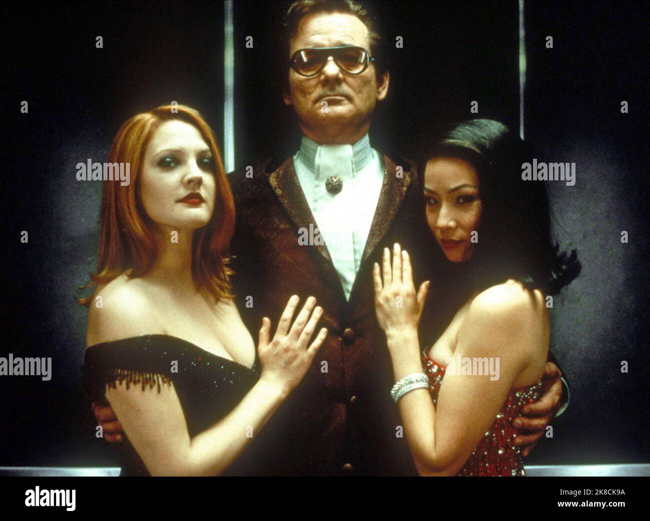 Drew Barrymore, Bill Murray & Lucy Liu Film: Charlie'S Angels (USA/DE 2000) Characters: Dylan Sanders,John Bosley,Alex Munday  / Drei Director: Mcg (Joseph Mcginty Nichol ) 18 June 2000   **WARNING** This Photograph is for editorial use only and is the copyright of COLUMBIA PICTURES and/or the Photographer assigned by the Film or Production Company and can only be reproduced by publications in conjunction with the promotion of the above Film. A Mandatory Credit To COLUMBIA PICTURES is required. The Photographer should also be credited when known. No commercial use can be granted without writte Stock Photo