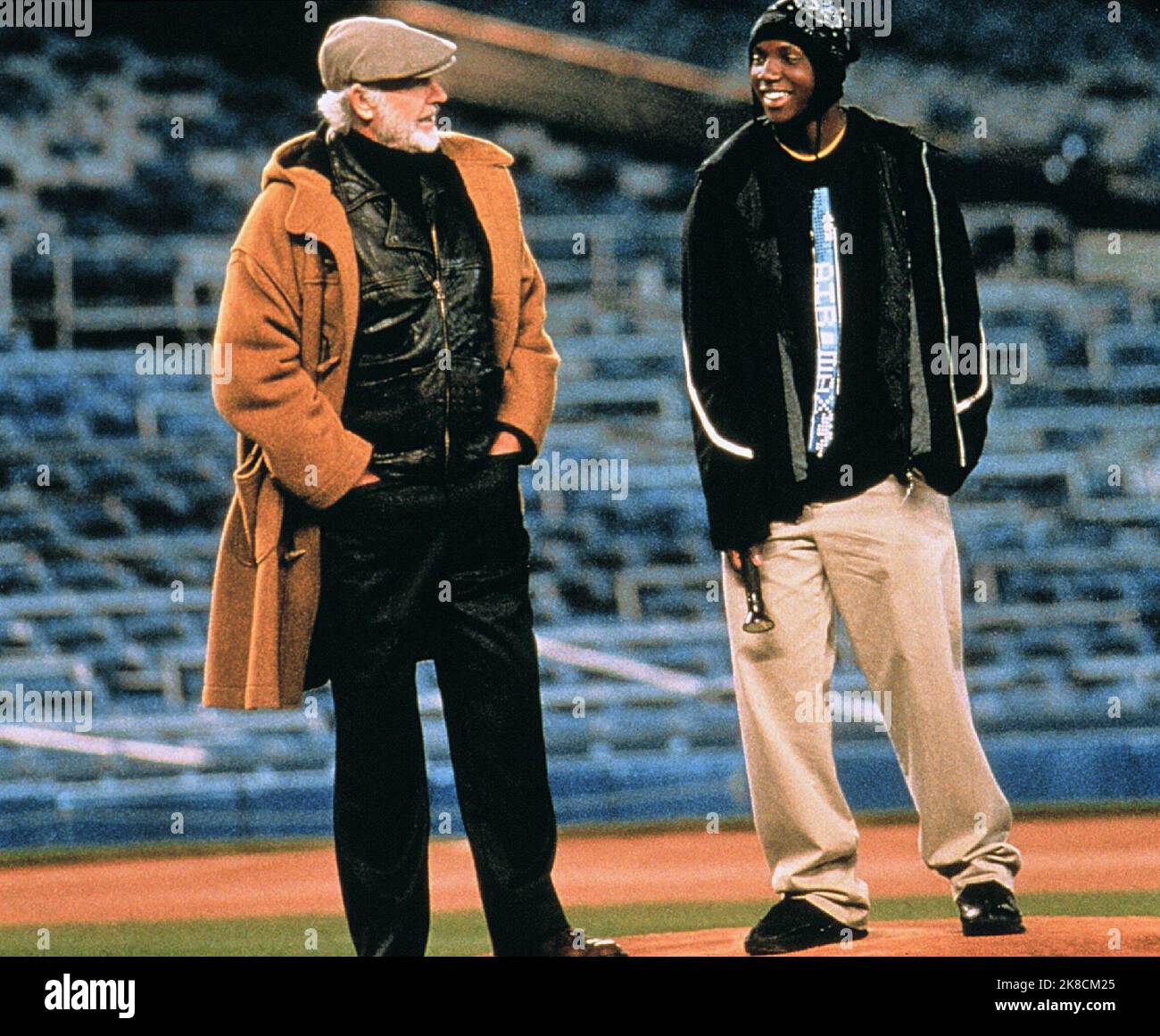 Sean Connery & Rob Brown Film: Finding Forrester (2000) Characters: William Forrester & Jamal Wallace  Director: Gus Van Sant 19 December 2000   **WARNING** This Photograph is for editorial use only and is the copyright of COLUMBIA and/or the Photographer assigned by the Film or Production Company and can only be reproduced by publications in conjunction with the promotion of the above Film. A Mandatory Credit To COLUMBIA is required. The Photographer should also be credited when known. No commercial use can be granted without written authority from the Film Company. Stock Photo