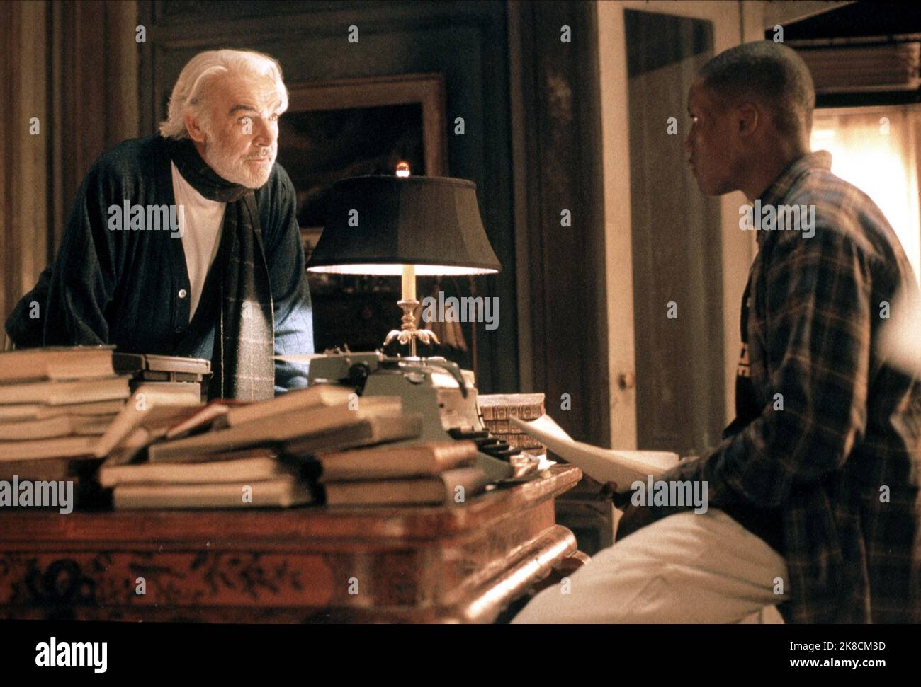 Sean Connery & Rob Brown Film: Finding Forrester (2000) Characters: William Forrester & Jamal Wallace  Director: Gus Van Sant 19 December 2000   **WARNING** This Photograph is for editorial use only and is the copyright of COLUMBIA and/or the Photographer assigned by the Film or Production Company and can only be reproduced by publications in conjunction with the promotion of the above Film. A Mandatory Credit To COLUMBIA is required. The Photographer should also be credited when known. No commercial use can be granted without written authority from the Film Company. Stock Photo