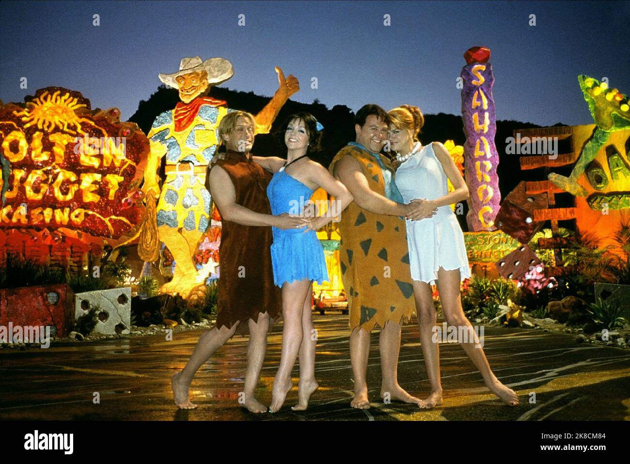 Stephen Baldwin, Jane Krakowski, Mark Addy & Kristen Johnston Film: The Flintstones In Viva Rock Vegas (USA 2000) Characters: Barney Rubble,Betty O'Shale,Fred Flintstone,Wilma Slaghoople  Director: Brian Levant 15 April 2000   **WARNING** This Photograph is for editorial use only and is the copyright of UNIVERSALHANNA-BARBERA PROD. and/or the Photographer assigned by the Film or Production Company and can only be reproduced by publications in conjunction with the promotion of the above Film. A Mandatory Credit To UNIVERSALHANNA-BARBERA PROD. is required. The Photographer should also be credi Stock Photo