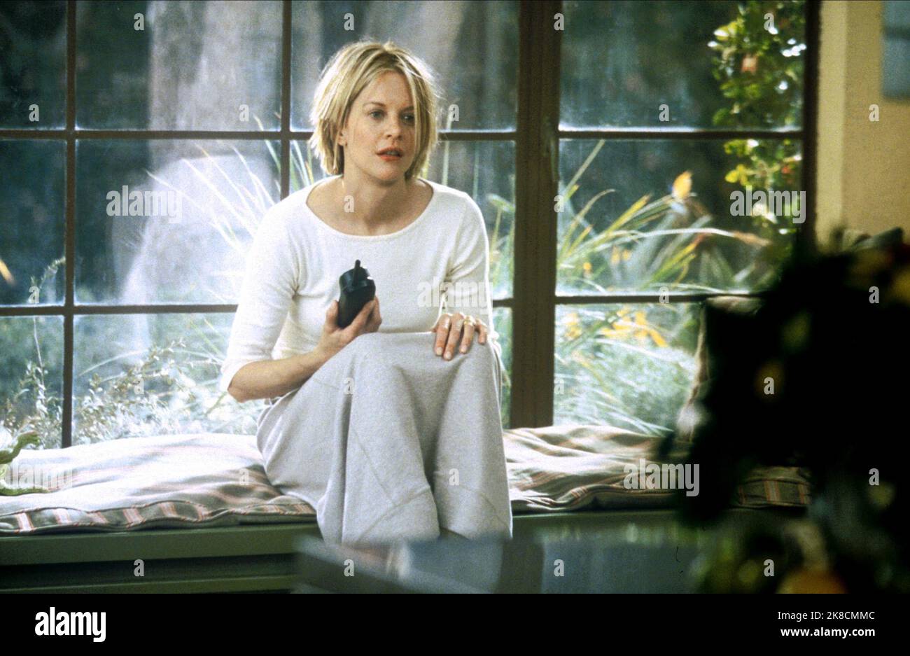 Meg Ryan Film: Hanging Up (2000) Characters: Eve Mozell Marks  Director: Diane Keaton 16 February 2000   **WARNING** This Photograph is for editorial use only and is the copyright of COLUMBIA PICTURES and/or the Photographer assigned by the Film or Production Company and can only be reproduced by publications in conjunction with the promotion of the above Film. A Mandatory Credit To COLUMBIA PICTURES is required. The Photographer should also be credited when known. No commercial use can be granted without written authority from the Film Company. Stock Photo
