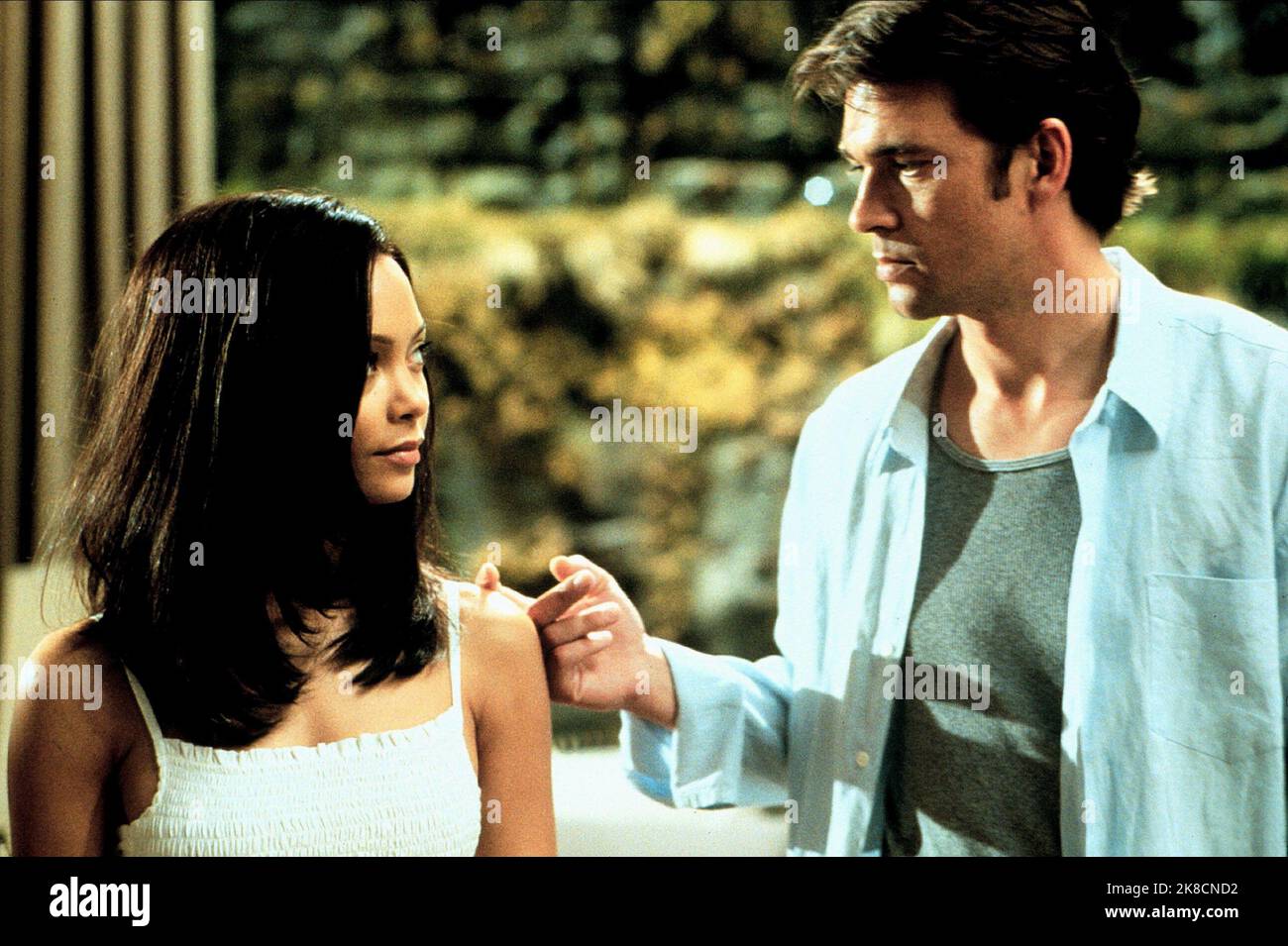 Thandie Newton & Dougray Scott Film: Mission: Impossible Ii; Mission Impossible 2 (USA/DE 2000) Characters: Nyah Nordoff-Hall & Sean Ambrose  Director: John Woo 24 May 2000   **WARNING** This Photograph is for editorial use only and is the copyright of PARAMOUNT PICTURES and/or the Photographer assigned by the Film or Production Company and can only be reproduced by publications in conjunction with the promotion of the above Film. A Mandatory Credit To PARAMOUNT PICTURES is required. The Photographer should also be credited when known. No commercial use can be granted without written authority Stock Photo