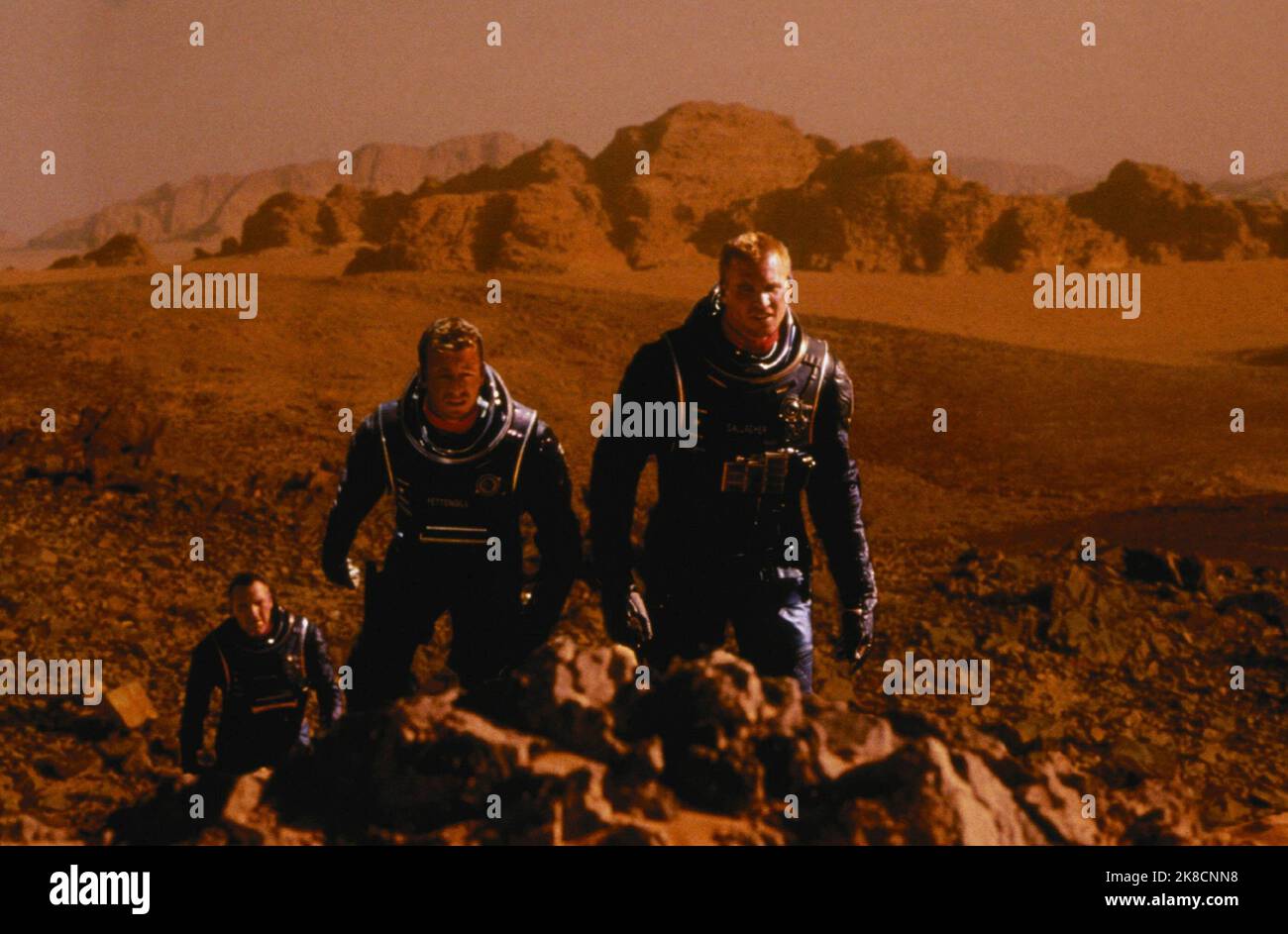Tom Sizemore, Simon Baker & Val Kilmer Film: Red Planet (USA/AUS 2000) Characters: Dr. Quinn Burchenal,Chip Pettengill & Robby Gallagher  Director: Antony Hoffman 06 November 2000   **WARNING** This Photograph is for editorial use only and is the copyright of WARNER BROS. and/or the Photographer assigned by the Film or Production Company and can only be reproduced by publications in conjunction with the promotion of the above Film. A Mandatory Credit To WARNER BROS. is required. The Photographer should also be credited when known. No commercial use can be granted without written authority from Stock Photo