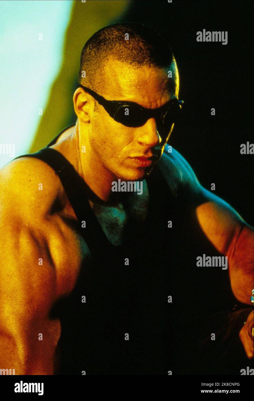 Vin Diesel Film: Pitch Black (USA 2000) Characters: Richard B. Riddick  Director: David Twohy 18 February 2000   **WARNING** This Photograph is for editorial use only and is the copyright of UIP and/or the Photographer assigned by the Film or Production Company and can only be reproduced by publications in conjunction with the promotion of the above Film. A Mandatory Credit To UIP is required. The Photographer should also be credited when known. No commercial use can be granted without written authority from the Film Company. Stock Photo