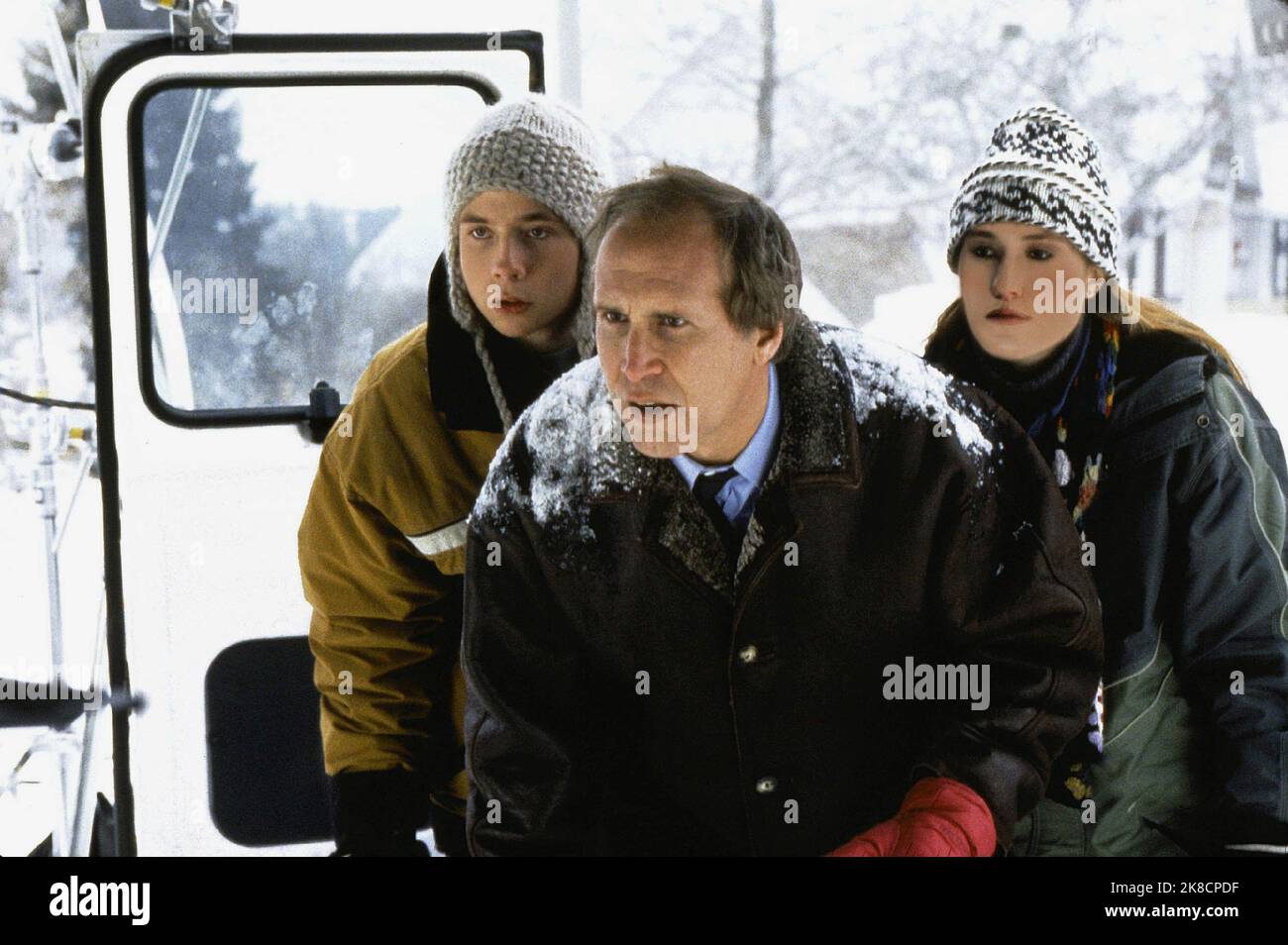Mark Webber, Chevy Chase & Schuyler Fisk Film: Snow Day (2000) Characters: Hal Brandston,Tom Brandston & Lane Leonard  Director: Chris Koch 29 January 2000   **WARNING** This Photograph is for editorial use only and is the copyright of PARAMOUNT PICTURES and/or the Photographer assigned by the Film or Production Company and can only be reproduced by publications in conjunction with the promotion of the above Film. A Mandatory Credit To PARAMOUNT PICTURES is required. The Photographer should also be credited when known. No commercial use can be granted without written authority from the Film Co Stock Photo
