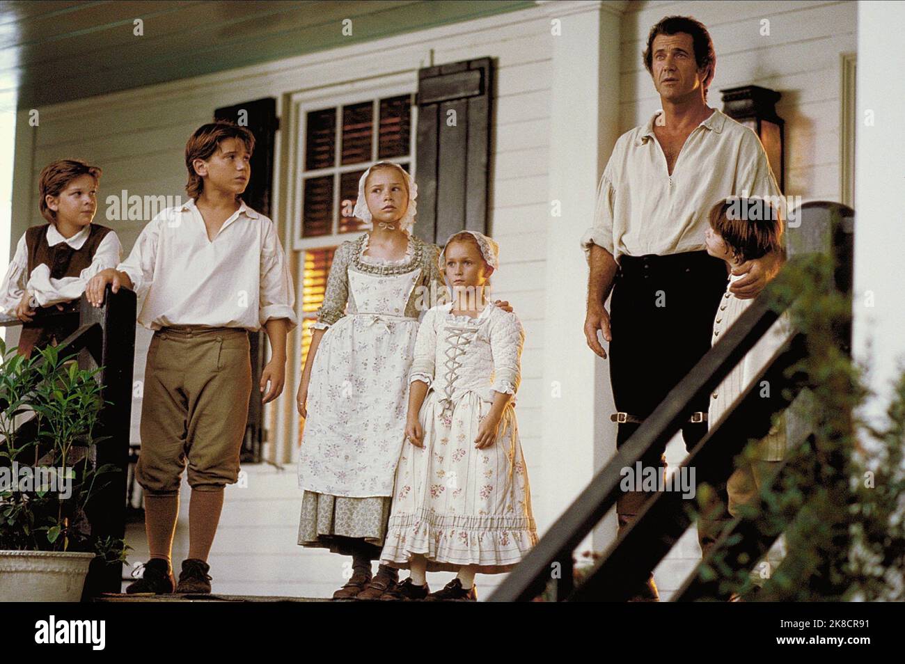 Trevor Morgan, Bryan Chaffin, Mika Boorem, Skye Mccole Bartusiak, Mel Gibson & Logan Lerman Film: The Patriot (USA/DE 2000) Characters: Nathan Martin, Margaret Martin, Susan Martin, Benjamin Martin, William Martin  Director: Roland Emmerich 27 June 2000   **WARNING** This Photograph is for editorial use only and is the copyright of COLUMBIA PICTURES and/or the Photographer assigned by the Film or Production Company and can only be reproduced by publications in conjunction with the promotion of the above Film. A Mandatory Credit To COLUMBIA PICTURES is required. The Photographer should also be Stock Photo