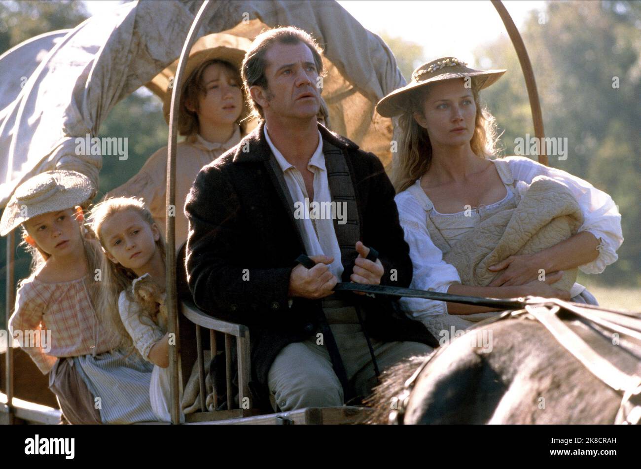 Skye Mccole Bartusiak, Mel Gibson & Joely Richardson Film: The Patriot (USA/DE 2000) Characters: Susan Martin, Benjamin Martin, Charlotte Selton  Director: Roland Emmerich 27 June 2000   **WARNING** This Photograph is for editorial use only and is the copyright of COLUMBIA PICTURES and/or the Photographer assigned by the Film or Production Company and can only be reproduced by publications in conjunction with the promotion of the above Film. A Mandatory Credit To COLUMBIA PICTURES is required. The Photographer should also be credited when known. No commercial use can be granted without written Stock Photo