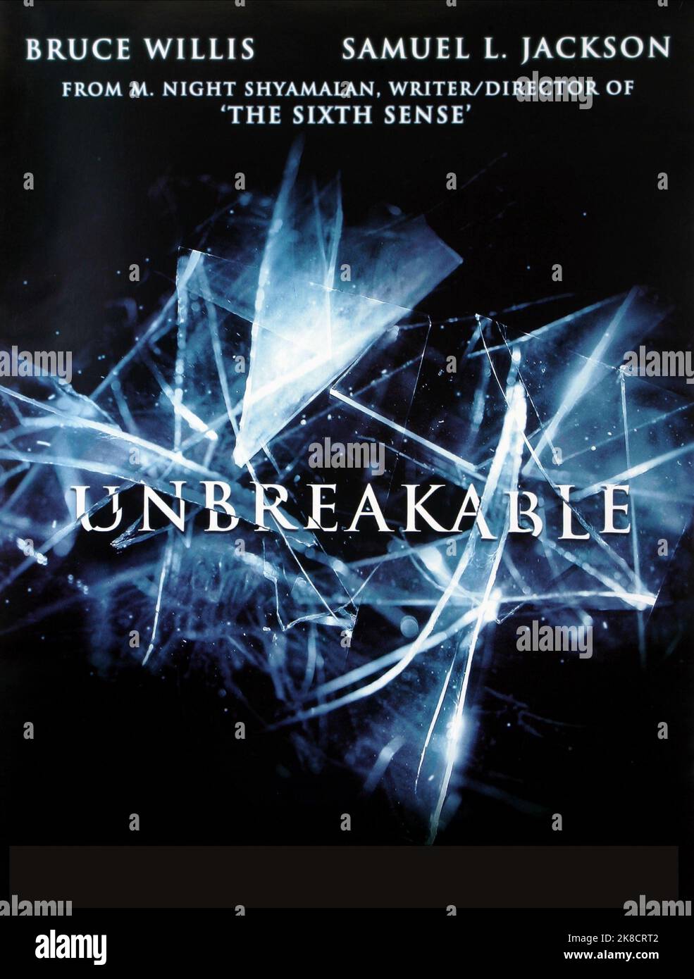 Film Poster Film: Unbreakable (USA 2000)   Director: M. Night Shyamalan 14 November 2000   **WARNING** This Photograph is for editorial use only and is the copyright of TOUCHSTONE and/or the Photographer assigned by the Film or Production Company and can only be reproduced by publications in conjunction with the promotion of the above Film. A Mandatory Credit To TOUCHSTONE is required. The Photographer should also be credited when known. No commercial use can be granted without written authority from the Film Company. Stock Photo