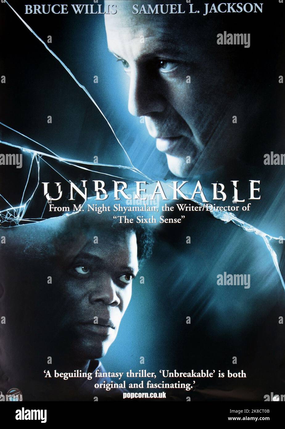 Samuel L. Jackson & Bruce Willis Poster Film: Unbreakable (USA 2000) Characters: Elijah Price &  Director: M. Night Shyamalan 14 November 2000   **WARNING** This Photograph is for editorial use only and is the copyright of TOUCHSTONE and/or the Photographer assigned by the Film or Production Company and can only be reproduced by publications in conjunction with the promotion of the above Film. A Mandatory Credit To TOUCHSTONE is required. The Photographer should also be credited when known. No commercial use can be granted without written authority from the Film Company. Stock Photo