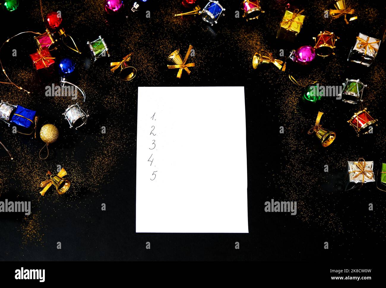 blank-sheet-of-paper-and-christmas-decorations-list-of-goals-stock