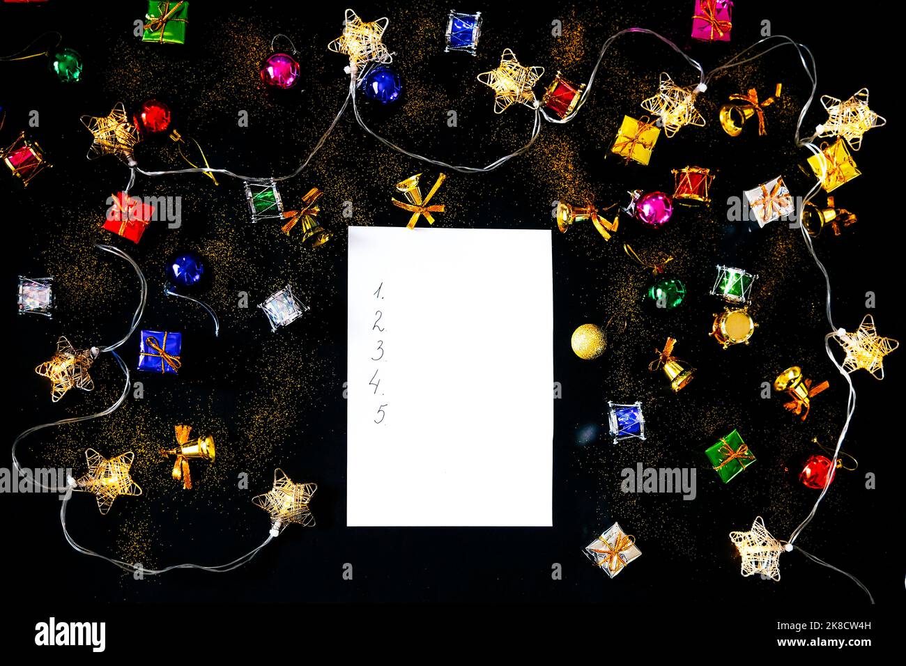 blank-sheet-of-paper-and-christmas-decorations-list-of-goals-stock