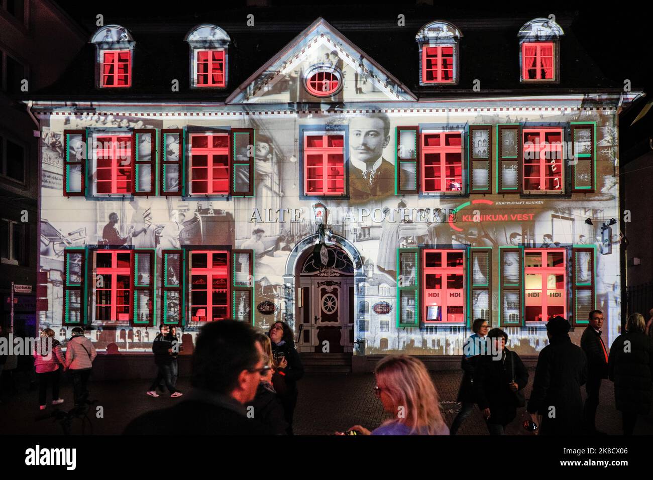 Recklinghausen, NRW, Germany. 22nd Oct, 2022. A medical history projection on a pharmacy building. Over 160 buildings and landmarks are illuminated with colourful lights and projections in the annual 'Recklinghausen Leuchtet' lights festival, which proves popular in the old town of Recklinghausen. The festival runs until November 6th. Credit: Imageplotter/Alamy Live News Stock Photo