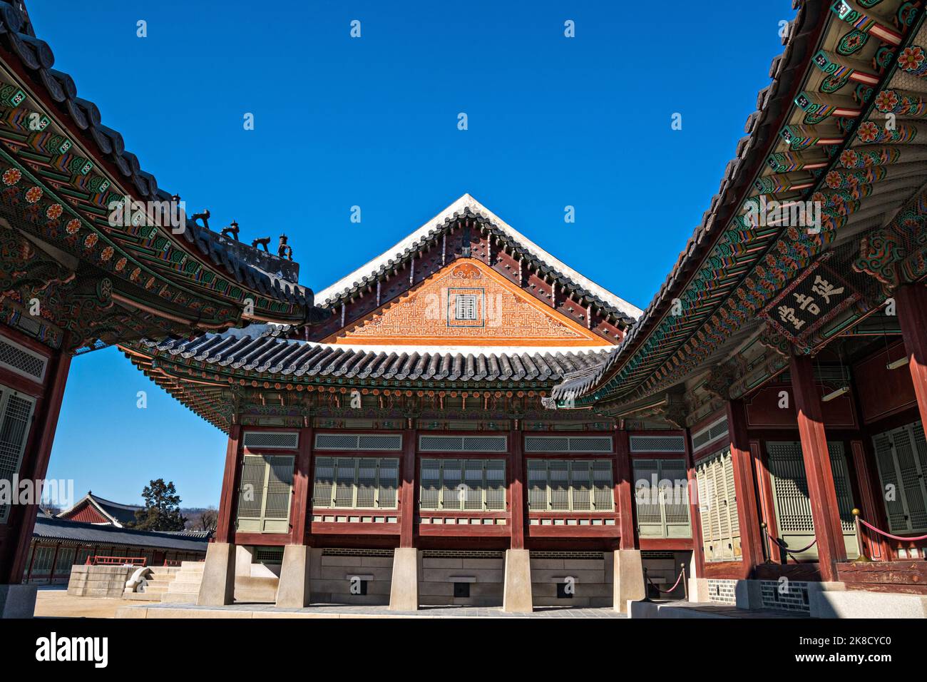 Traditional Korean architecture in the Gangnyeong-jeon or Kings Residence Hall complex, at the Gyeongbokgung Palace during winter in Seoul, South Korea. Stock Photo