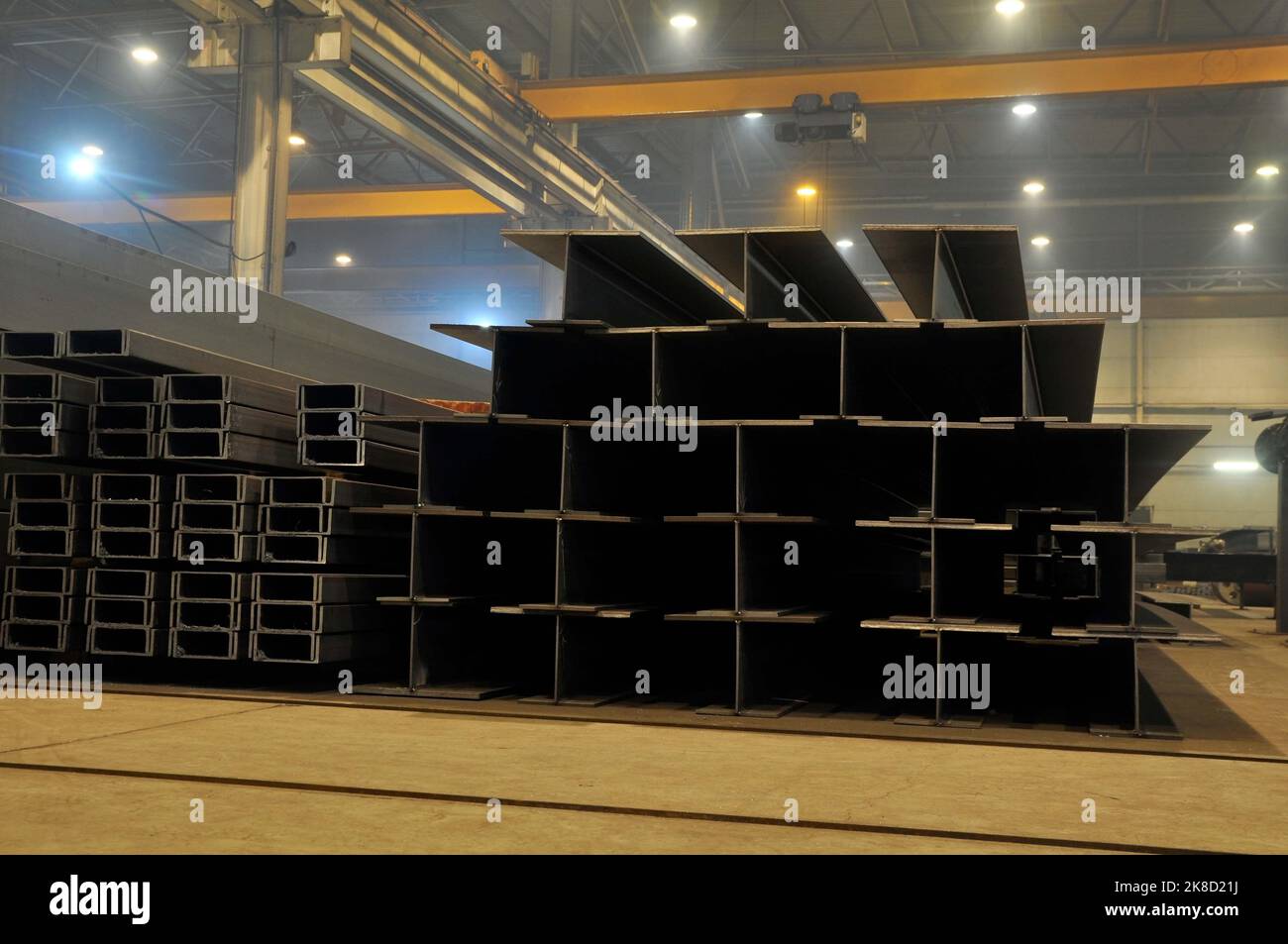 Warehousing in the workshop at the plant stock of metal I-beams profile ...