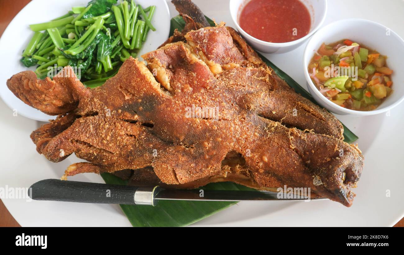 very tasty and delicious fried pork head Stock Photo