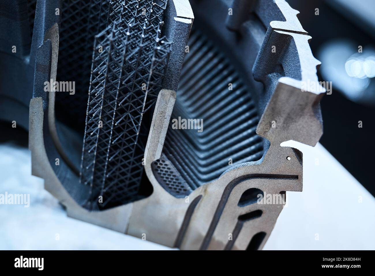 Complicated detail made by powder 3d printer in workshop Stock Photo