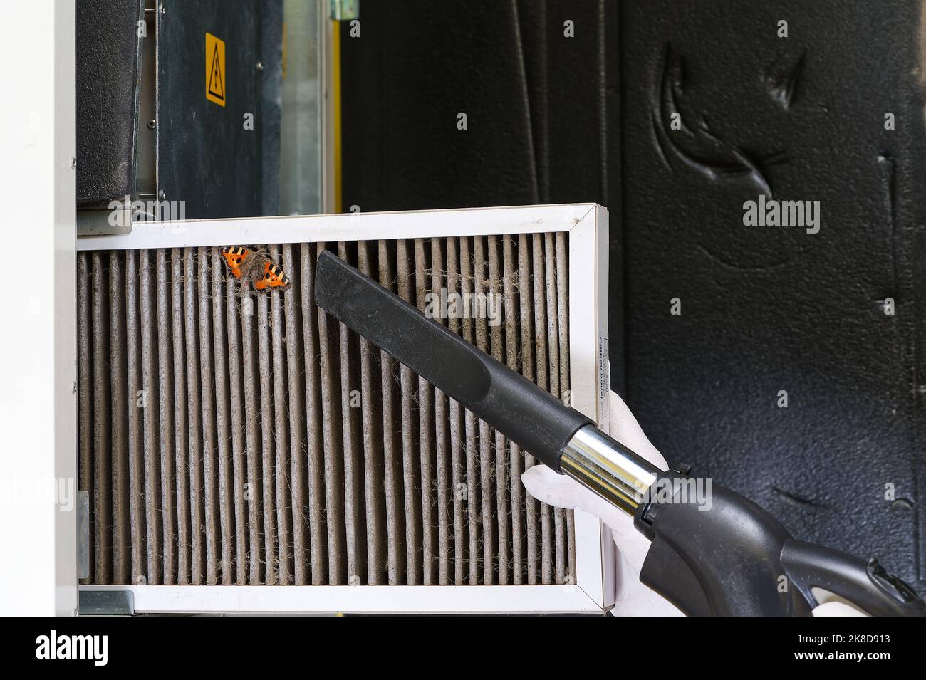 Replacing filter in the central ventilation system. hvac filter