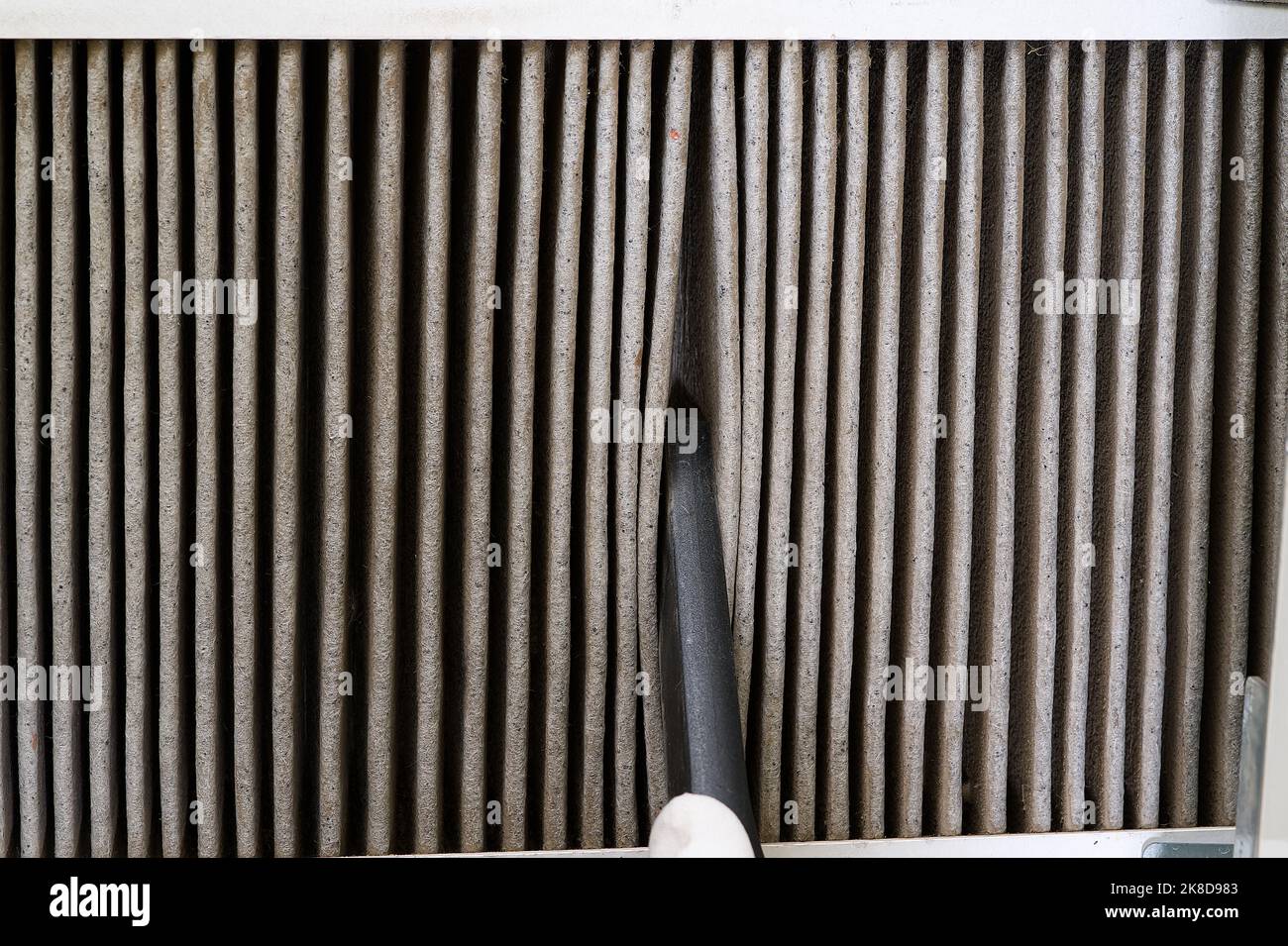 Replacing filter in the central ventilation system. hvac filter replacing home central air system Stock Photo