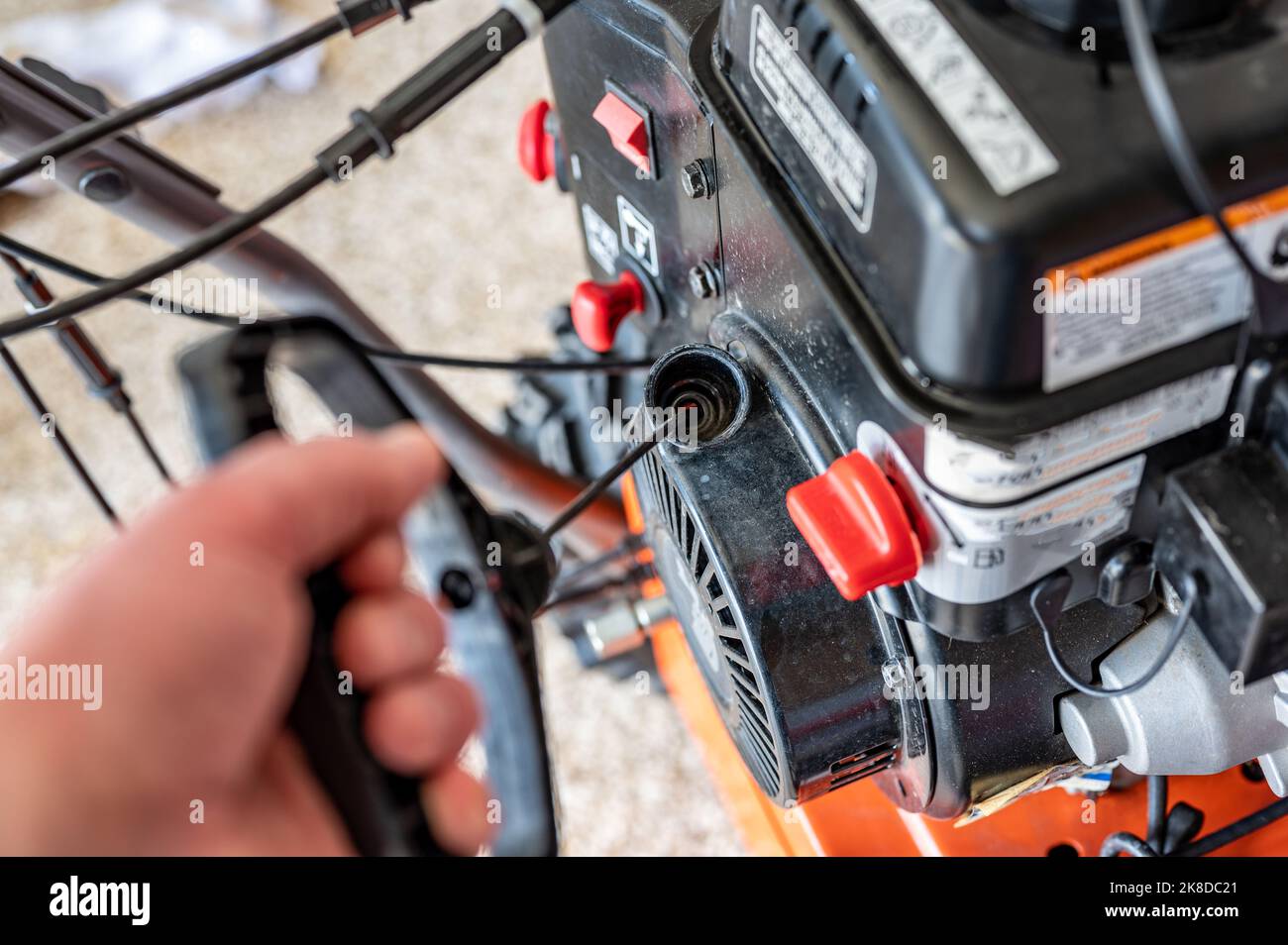 Pull cord to start a portable engine on a snow blower or lawn mower Stock Photo Alamy