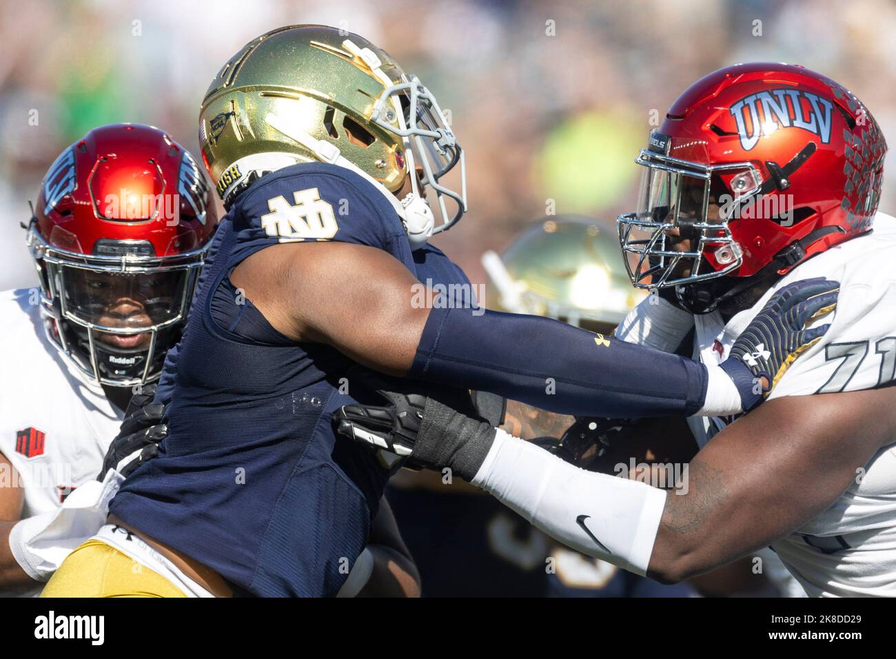 South Bend, Indiana, USA. 22nd Oct, 2022. UNLV offensive lineman Daviyon McDaniel (71) and Notre Dame defensive lineman Justin Ademilola (9) battle at the line of scrimmage during NCAA football game action between the UNLV Rebels and the Notre Dame Fighting Irish at Notre Dame Stadium in South Bend, Indiana. Notre Dame defeated UNLV 44-21. John Mersits/CSM/Alamy Live News Stock Photo