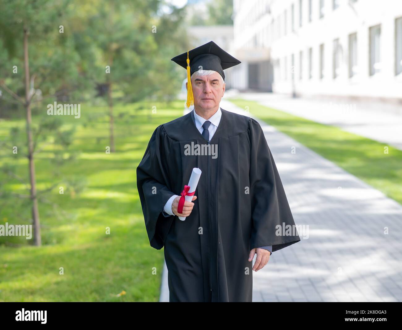 Male student in graduation outfit hi res stock photography and images Alamy