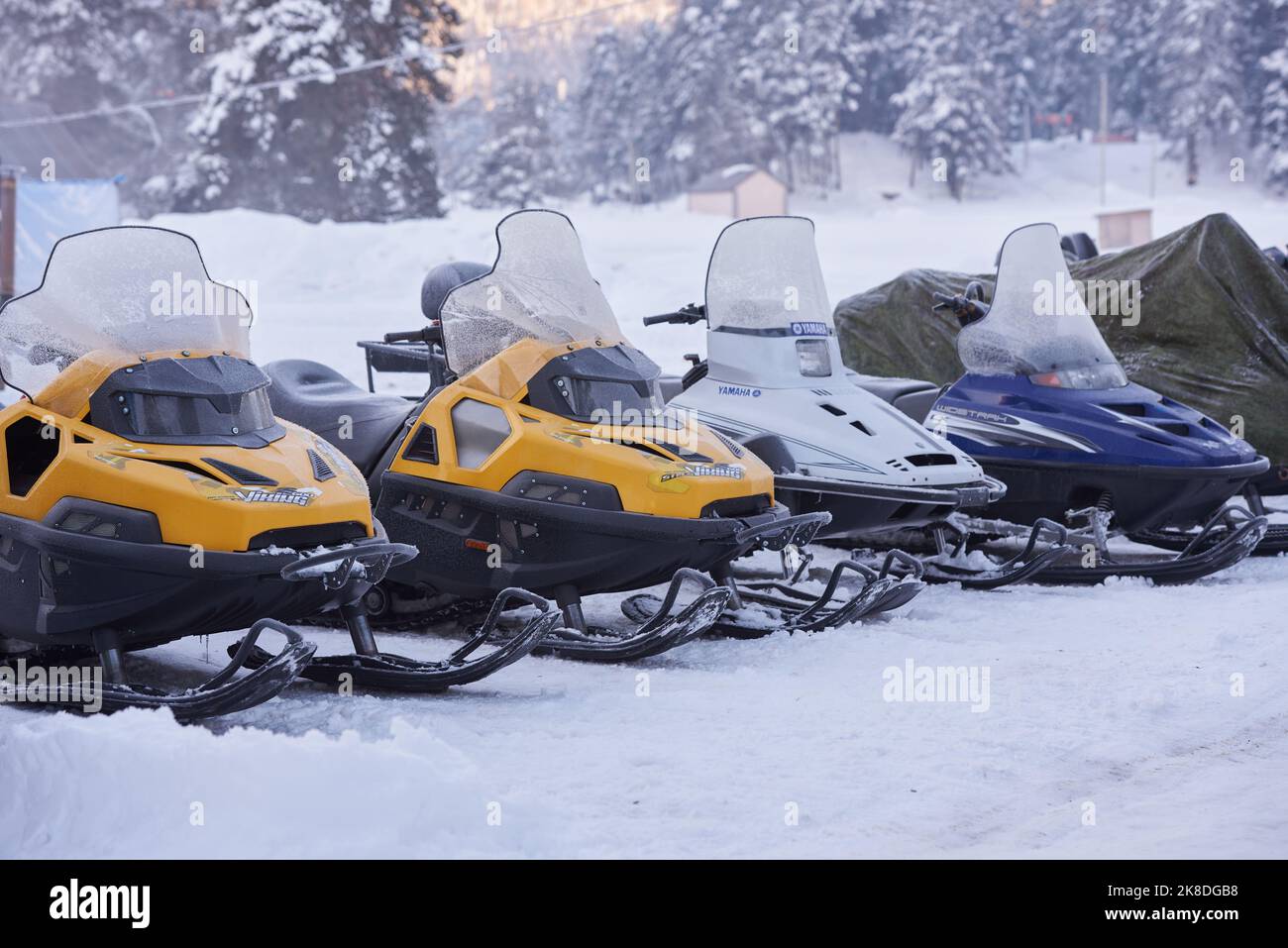 Snowmobiles of Yamaha for rent in mountain for tourists. Stock Photo