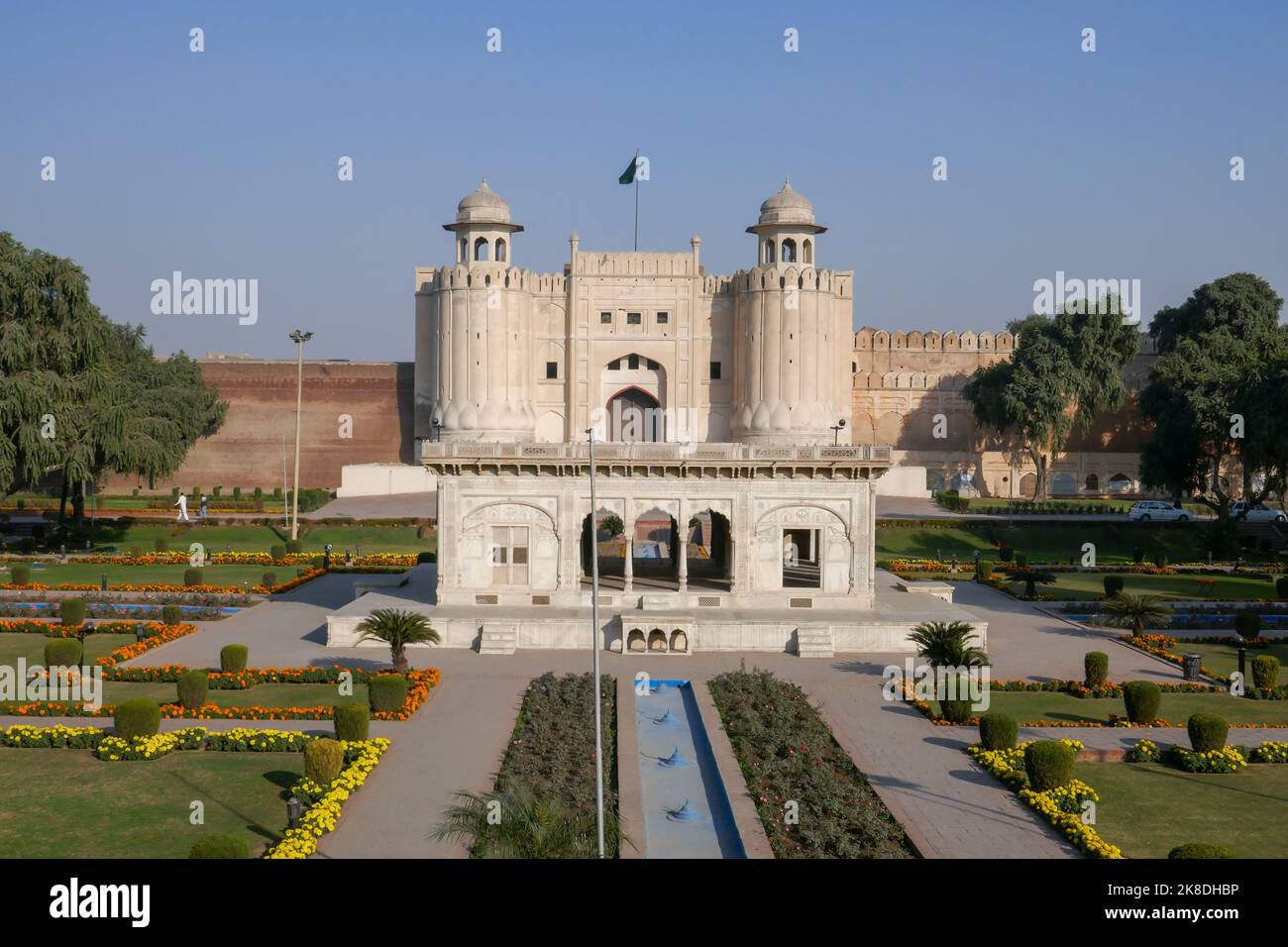 View with garden and marble pavilion of white Alamgiri gate built by mughal emperor Aurangzeb, Lahore fort, UNESCO World Heritage, Punjab, Pakistan Stock Photo