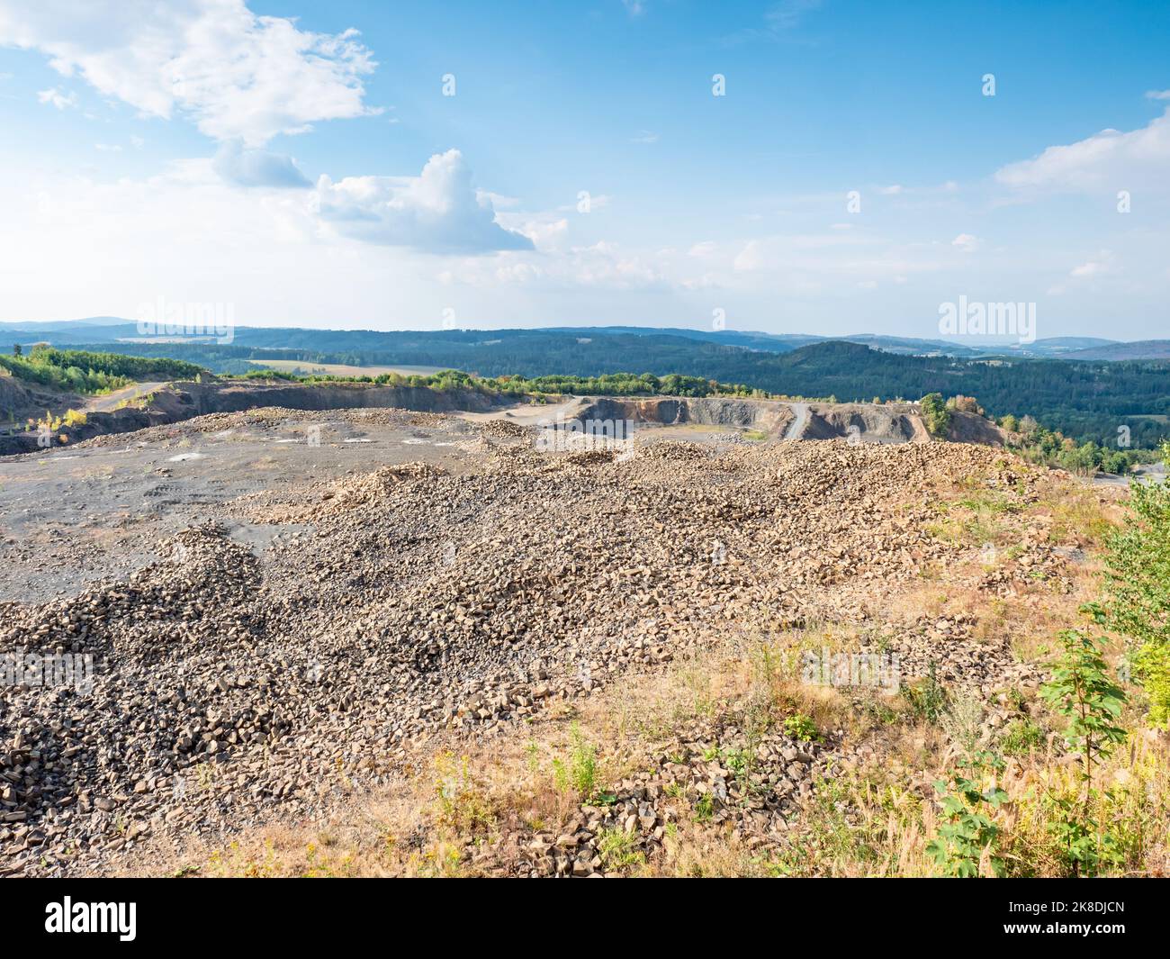 Open clinkstone or phonolite quarry. Black basalt stones mine. Industry ...