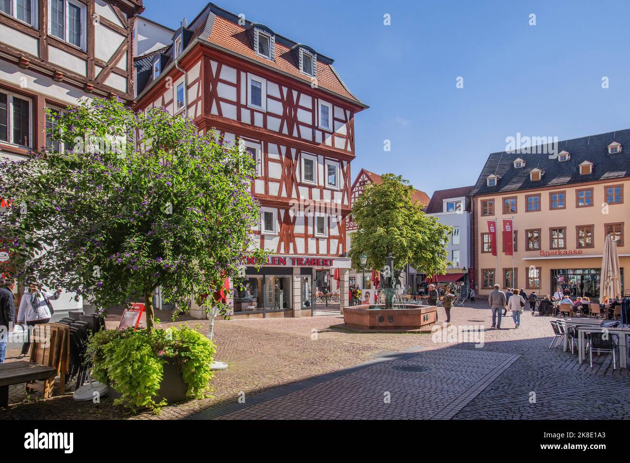 Market street and fountain with water carriers, Fulda, Fulda river