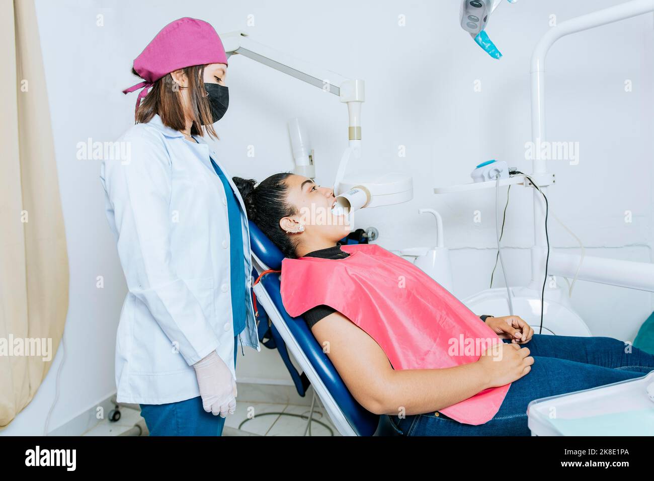 Intraoral radiography concept. Dentist doing intraoral dental xray to