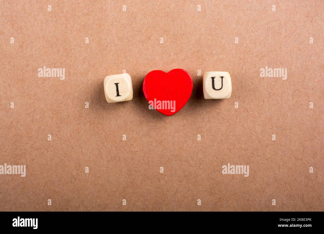 Phrase I Love You Made from Letter Cubes in in hand Stock Photo