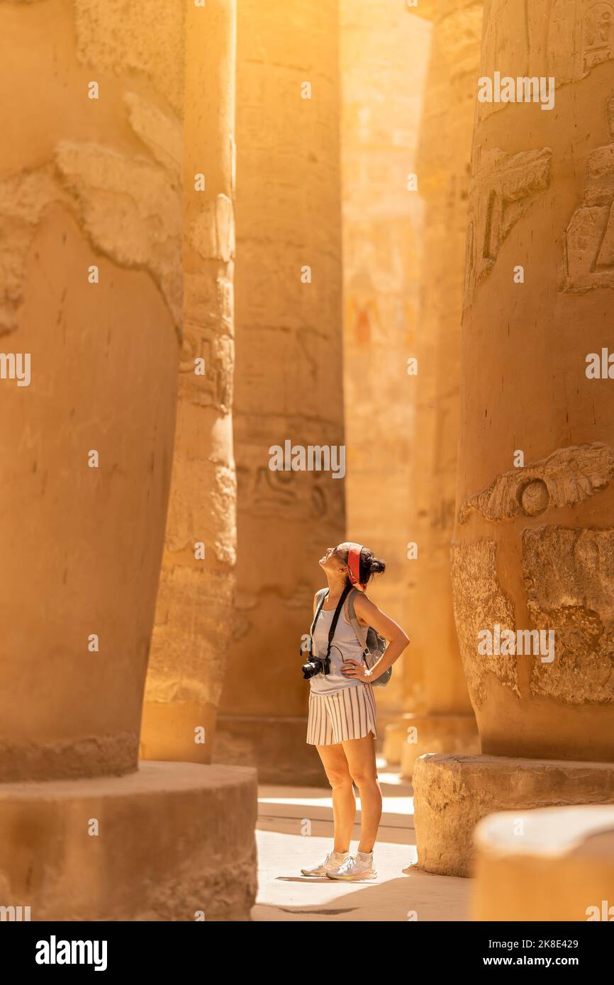 Tourist with camera in ancient Egyptian temples Stock Photo Alamy