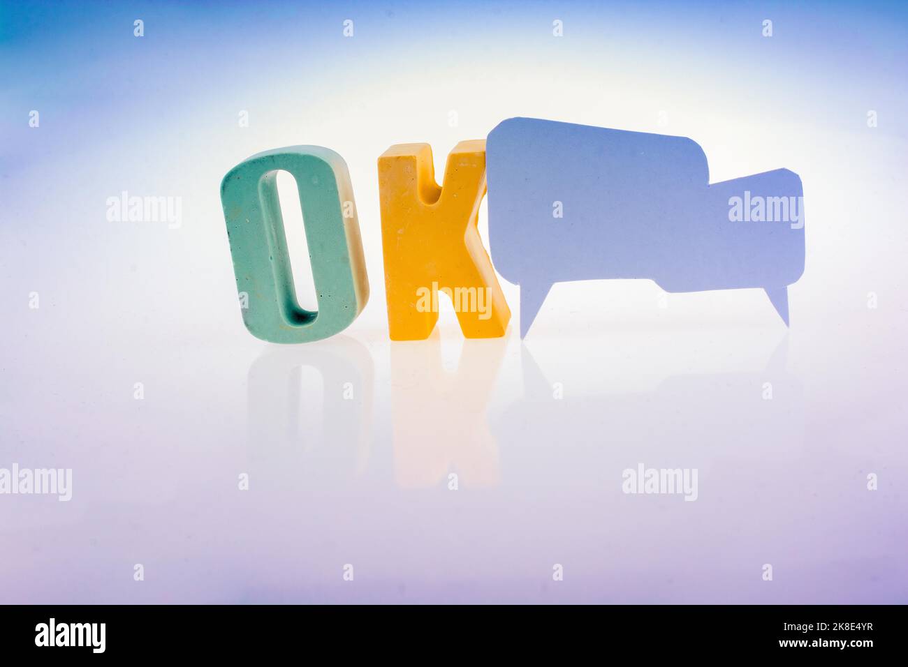 Speech bubble the word OK written with colorful letter blocks Stock Photo