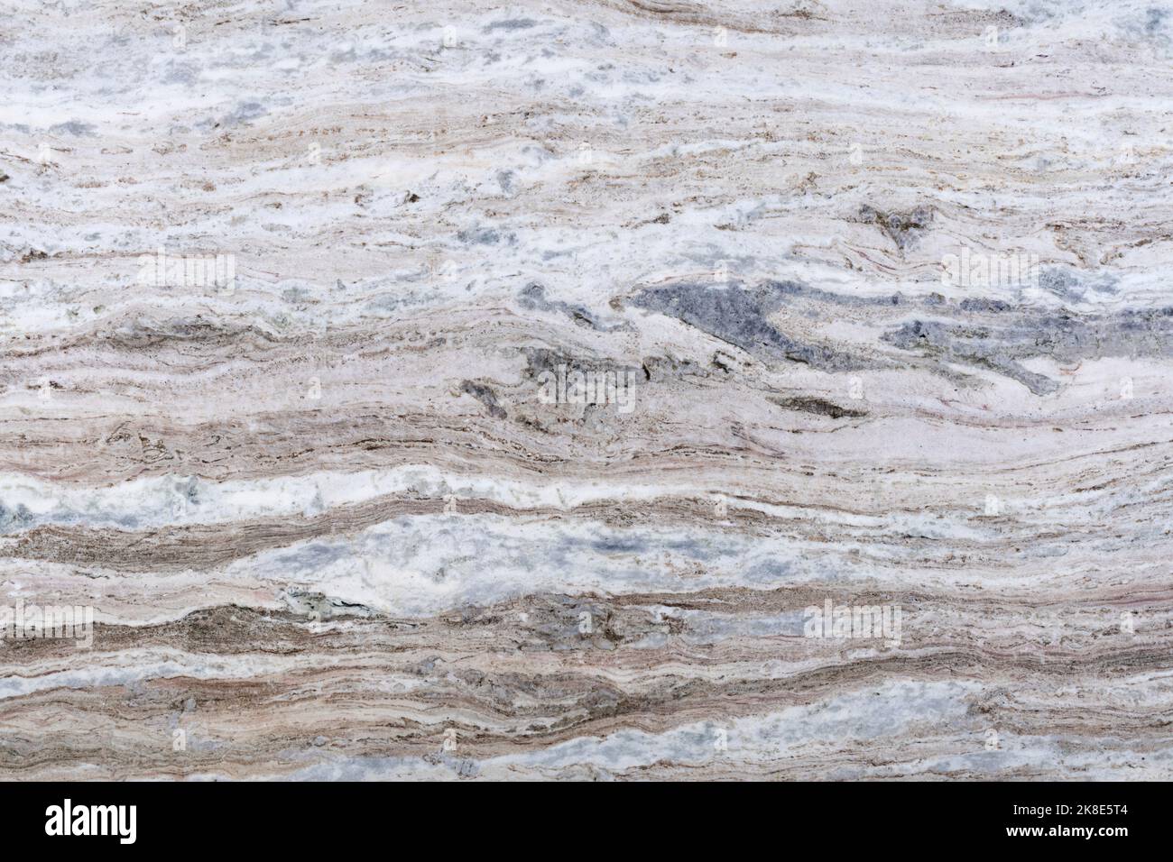 Fantasy brown commercial - natural quartzite stone texture, photo of slab. Background for interior home design. Matt pattern used as ceramic wall Stock Photo