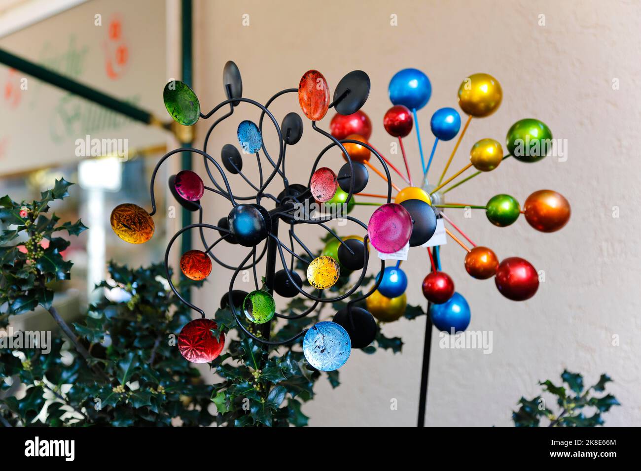 Flower shop in shopping street, decorative items for the garden