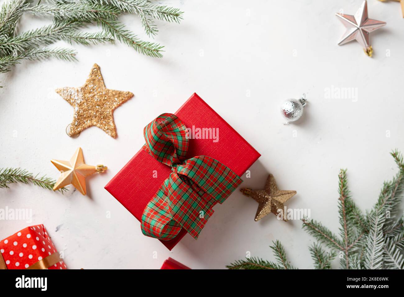 Top view of red gift Christmas box on light surface Stock Photo - Alamy