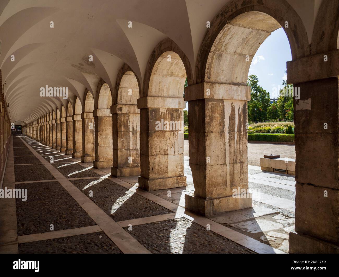 Stone arches in the corridors of the palace of Aranjuez Stock Photo