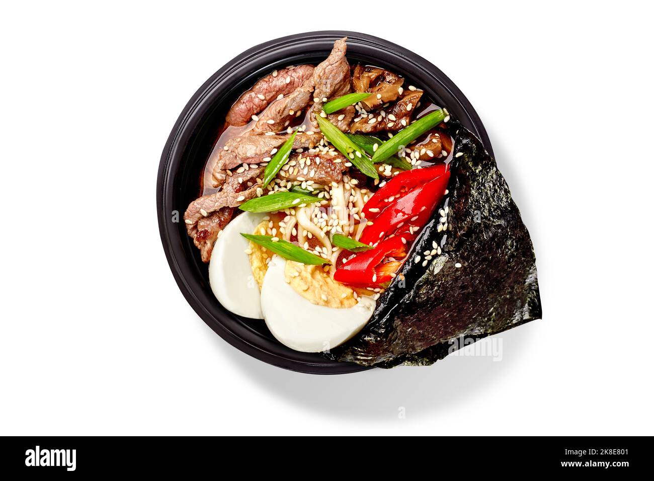 Spicy ramen soup with noodles, beef, shiitake mushrooms, boiled egg