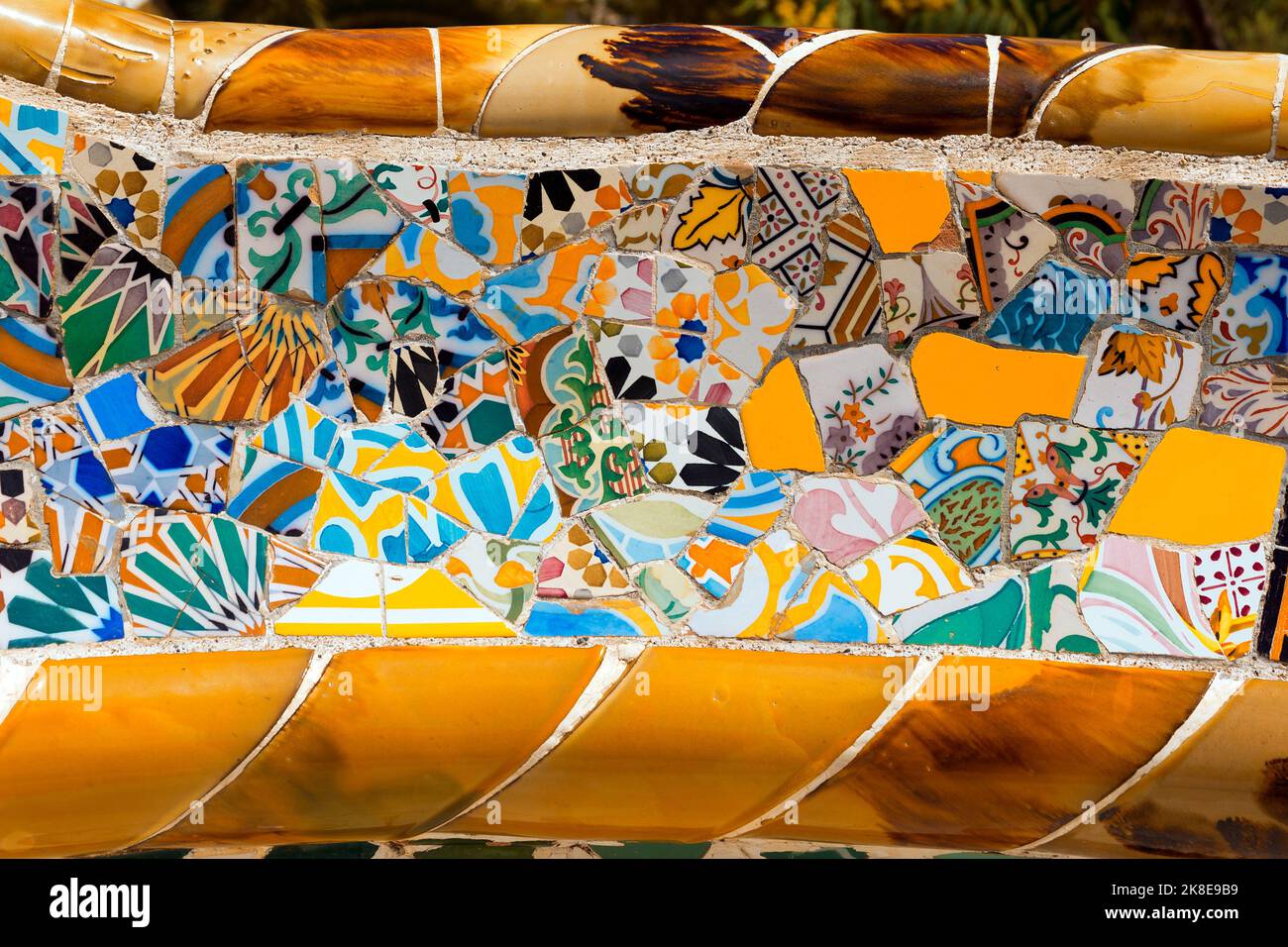 Barcelona. Detail of a ceramic bench in the Park Guell designed by the famous architect Antoni Gaudi (1852-1926). UNESCO, World Heritage Site. Stock Photo
