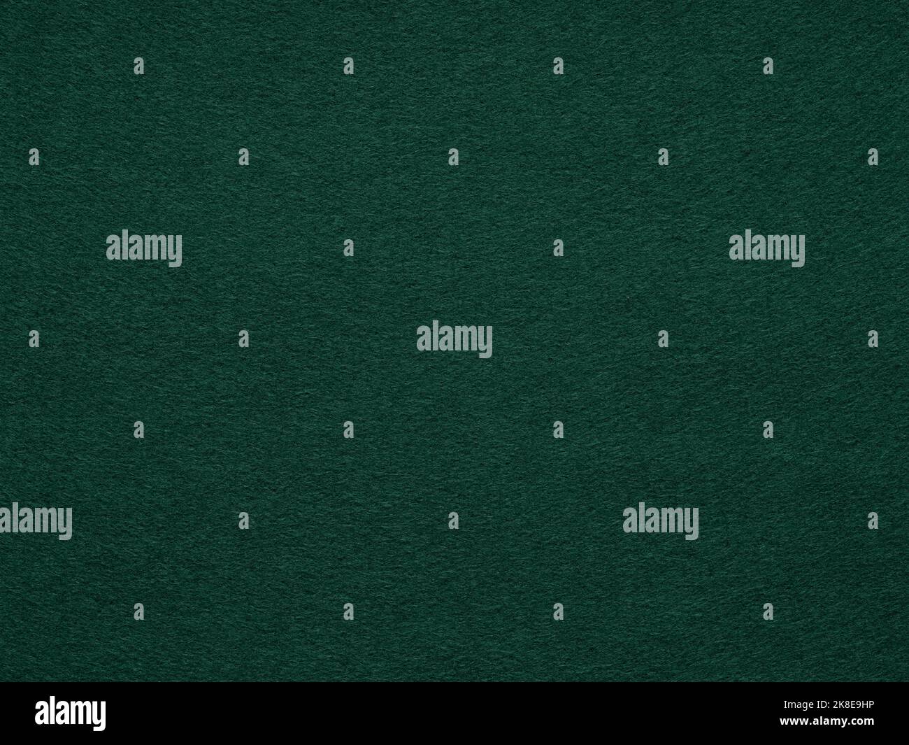 Dark green poker table felt soft rough textile material background