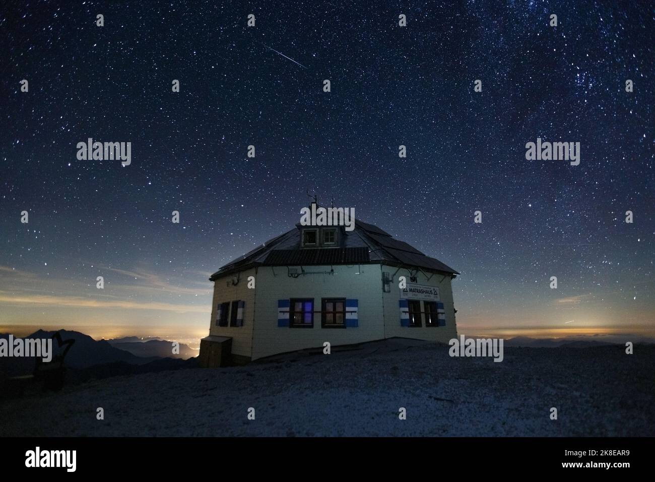 Starry sky, constellations. Matrashaus alpine refuge. Hochkönig mountain peak. Austria. Eastern Alps. Europe. Stock Photo