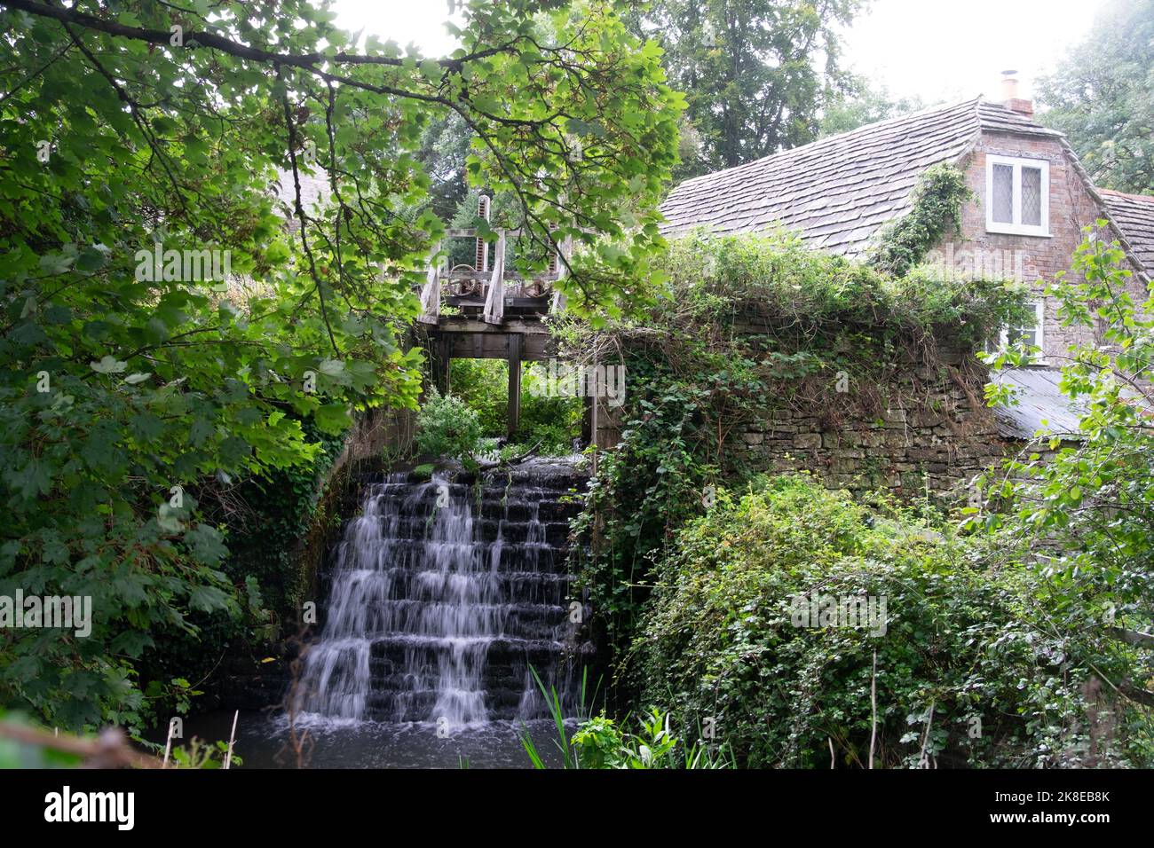 The Old Mill Waterfall - Corfe Castle, Isle of Purbeck, Dorset, UK Stock Photo