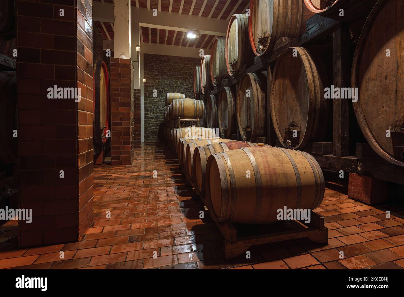 Old oak barrel rows in an authentic wine cellar of the french traditional winery Stock Photo Alamy