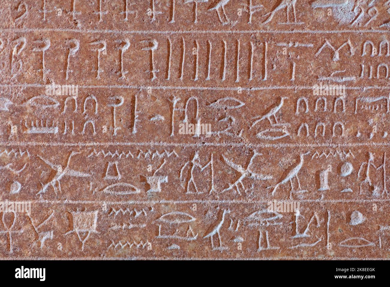 Egyptian hieroglyphs on the wall. Ancient egyptian hieroglyphs. Stock Photo